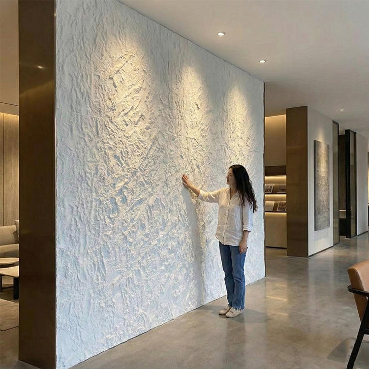 Flexible stone wall panels installed as a full-height textured feature wall in a lobby